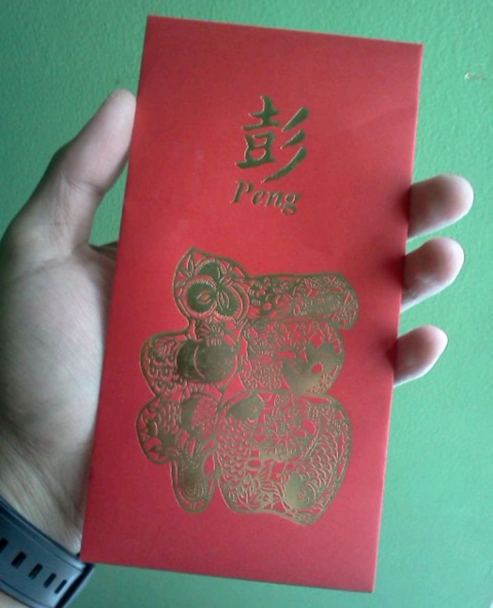 Hukum Menerima Angpao