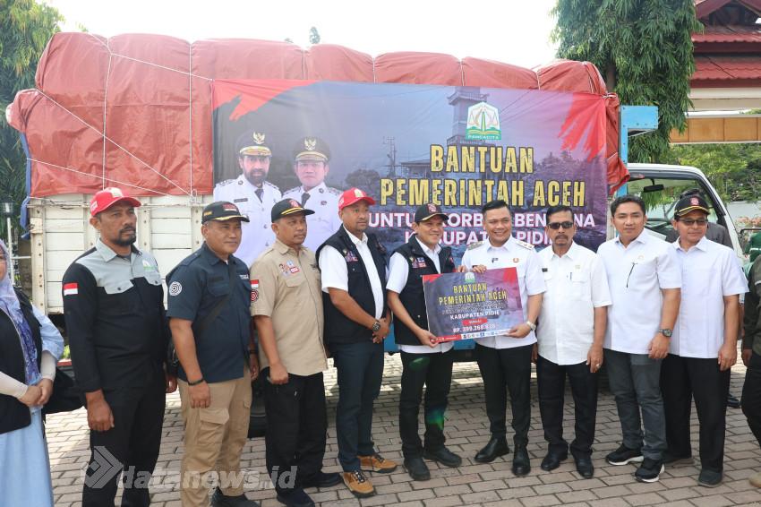 Didampingi Kadinsos, Wagub Aceh Serahkan Bantuan Bafferstok Ke Wabup Pidie